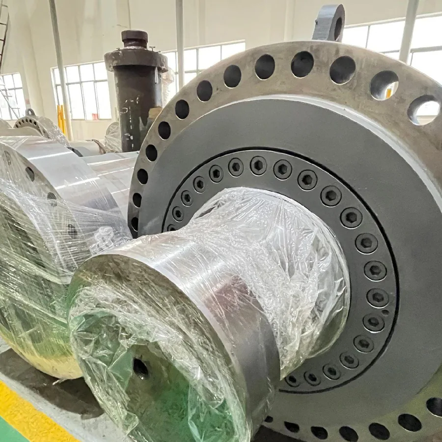 Industrial cylinder with flanged mounting and plastic-covered rod.
