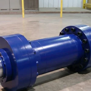 Single blue welded cylinder with flanged end on industrial floor