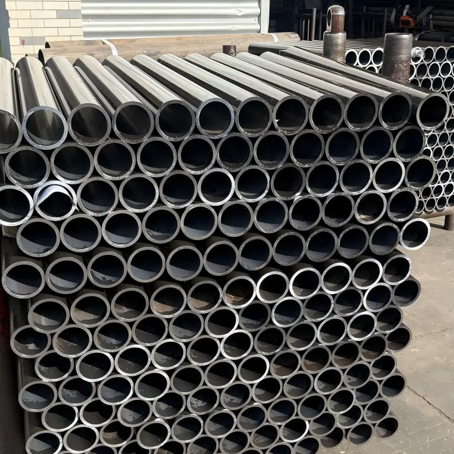 Stacked metal cylinders in outdoor industrial setting